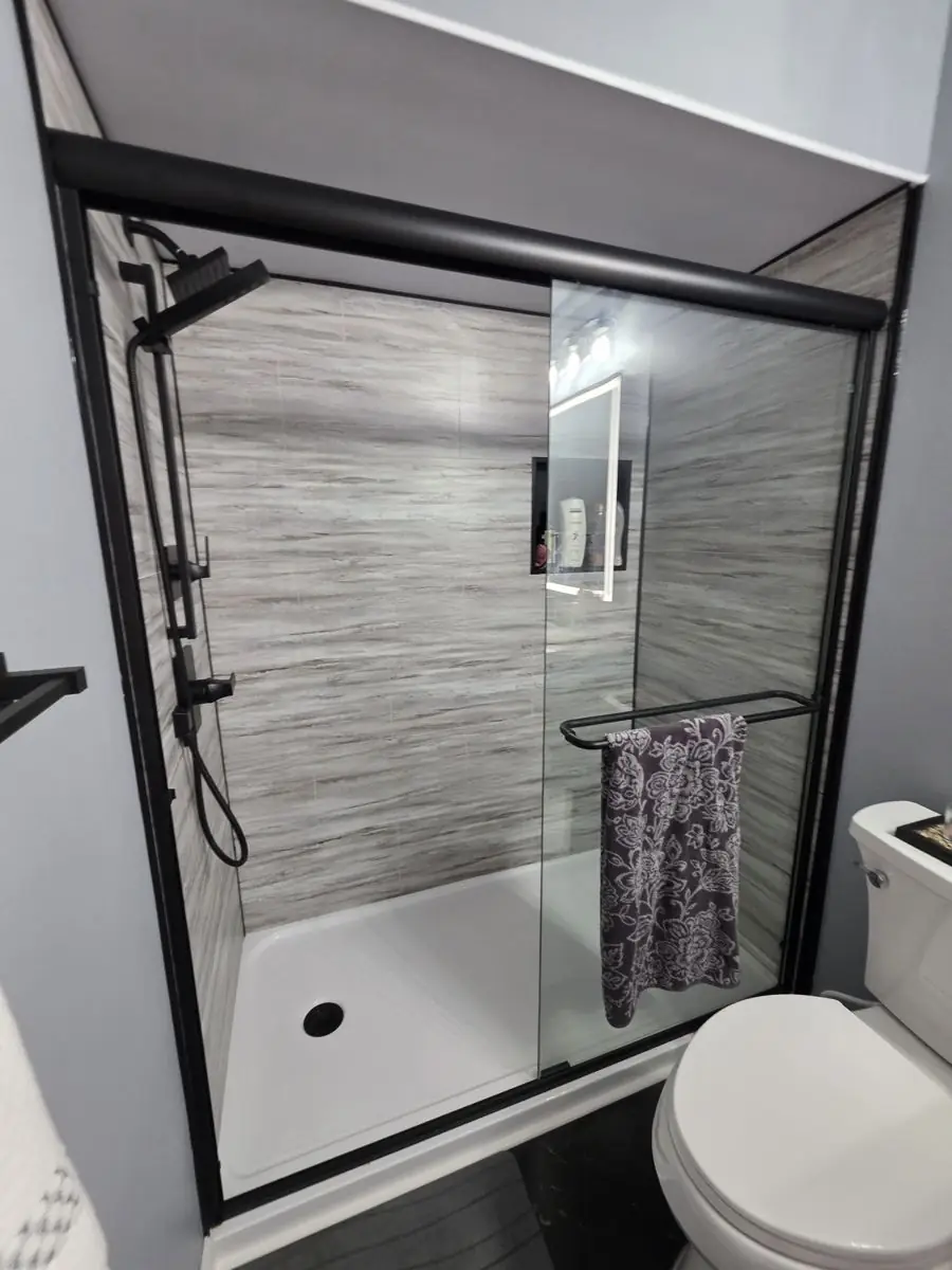 Remodeled bathroom with new glass shower and tile surround in Columbia County Oregon