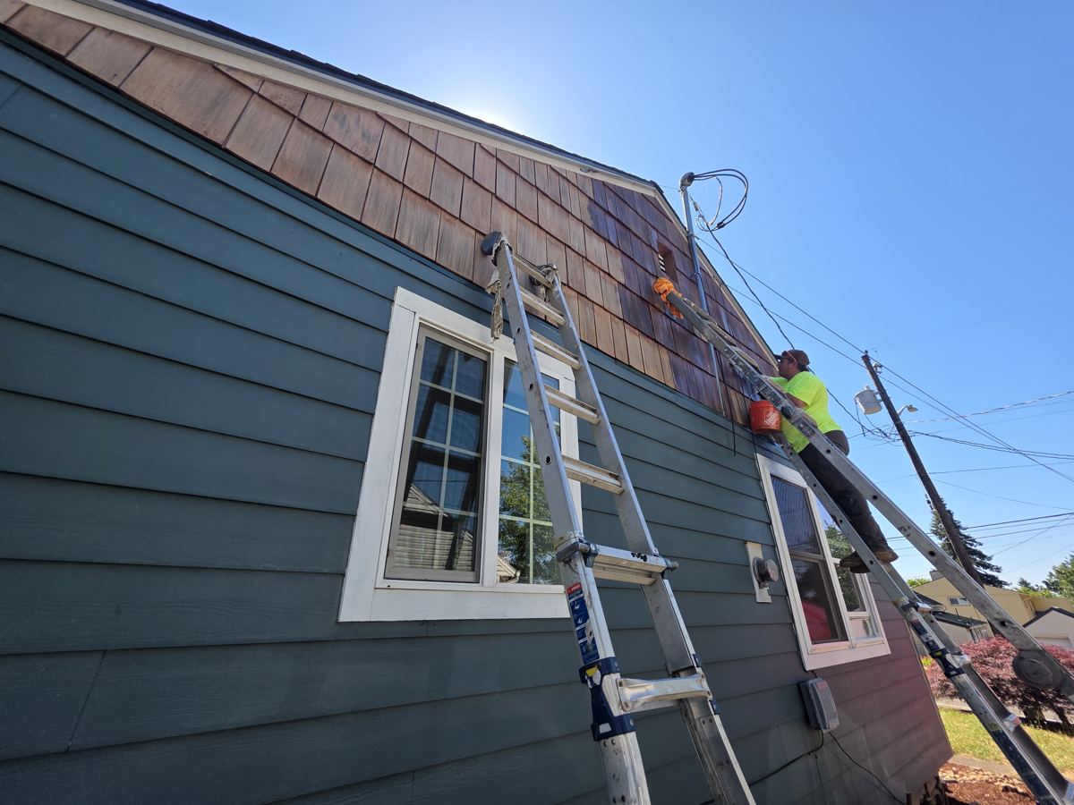 Installing cedar shingle siding on a gable in Columbia County Oregon