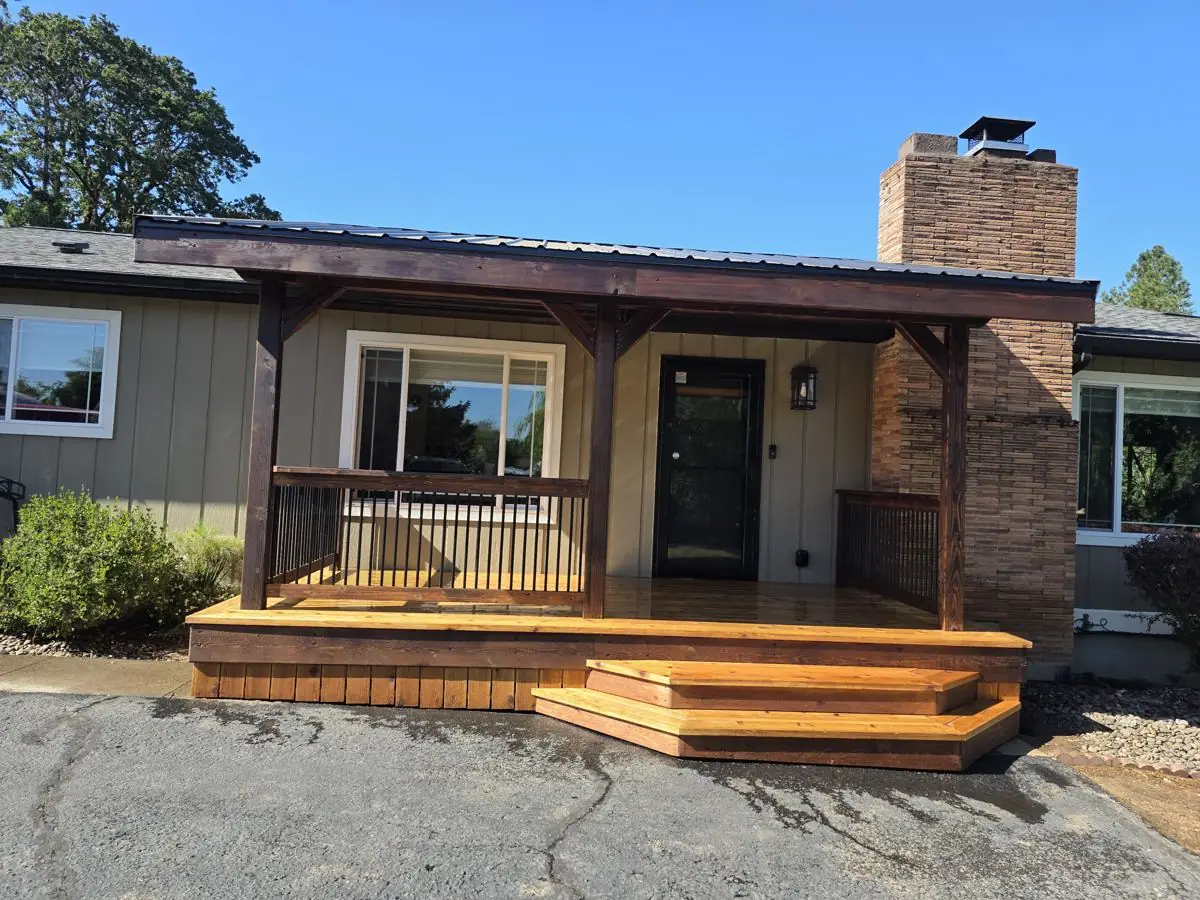 Finished covered deck with stained timber posts, metal roof and cedar steps built near St Helens Oregon