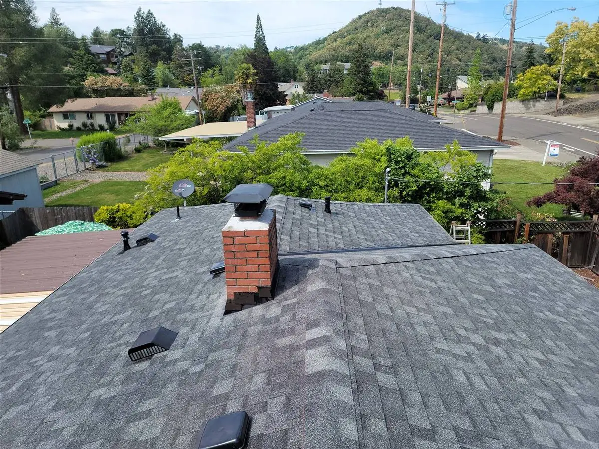 Completed architectural shingle roof replacement on a Columbia County Oregon home by Reno Masters LLC
