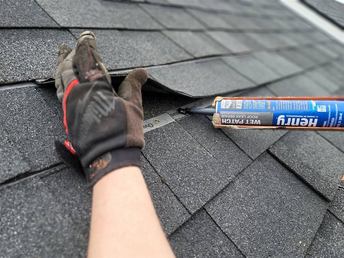 Roof leak repair detail on an asphalt shingle roof in St Helens Oregon