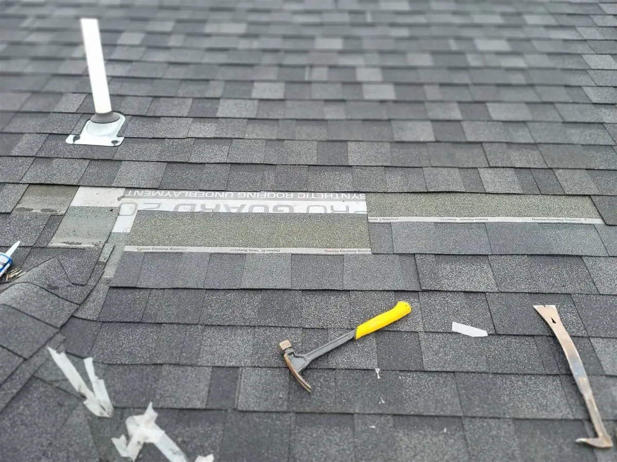 New shingles installed along a roof valley with ice and water shield in Columbia County Oregon