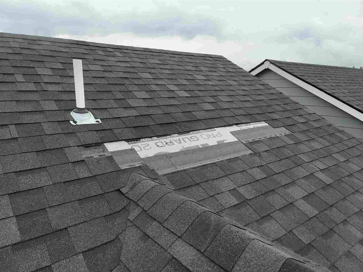 Finished asphalt shingle roof by Columbia County roofing company Reno Masters