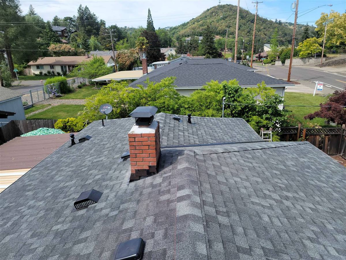 Full roof replacement with gray architectural shingles by Oregon roofing contractor