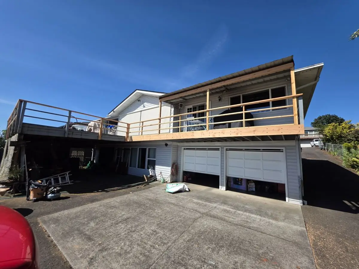 Wide view of a second-story deck built over a two-car garage in Columbia County Oregon